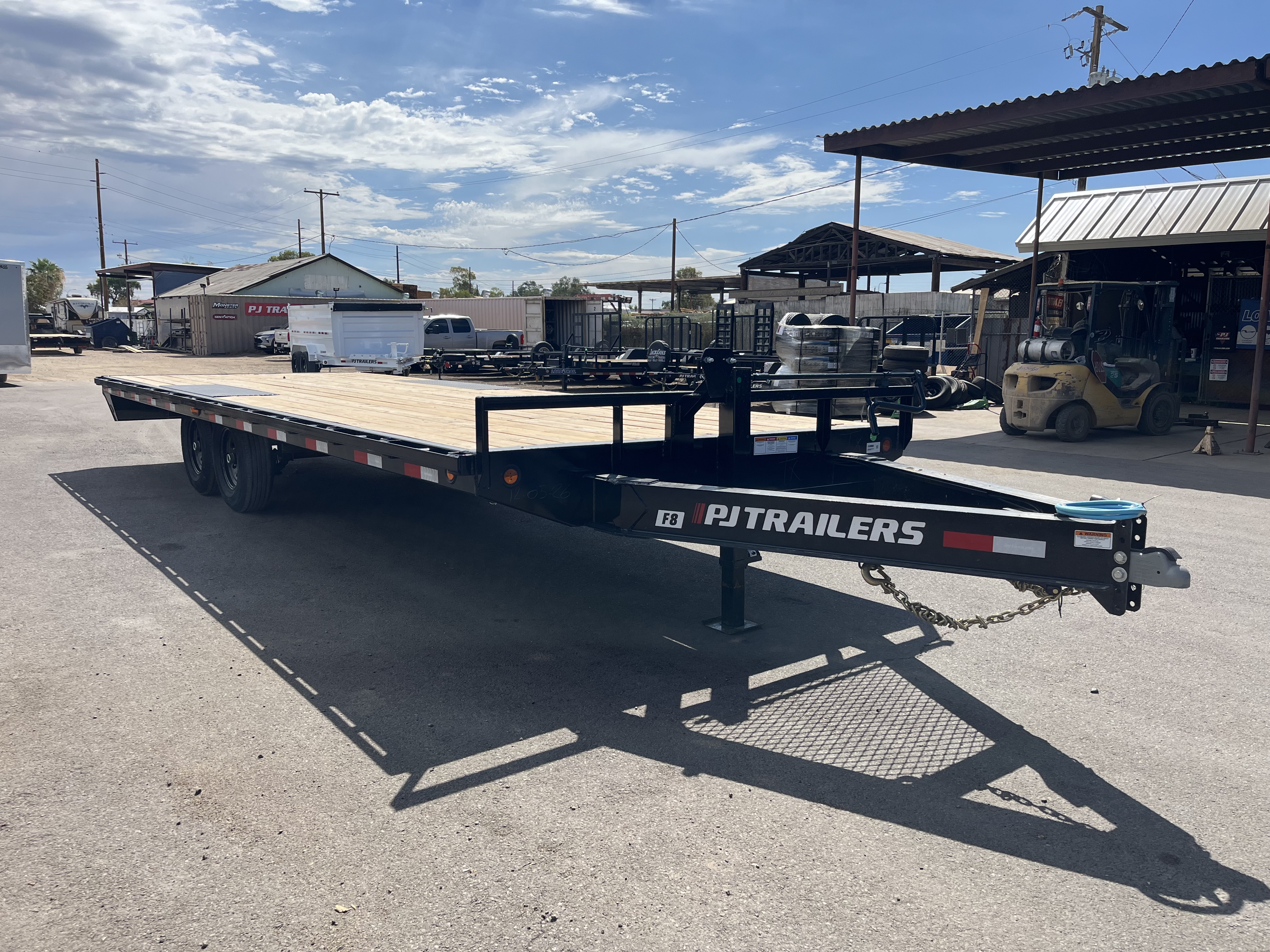 PJ Trailers 24x102 Tandem Axle Deckover, 14K GVWR, Slide In Ramps, 14 Ply Tires