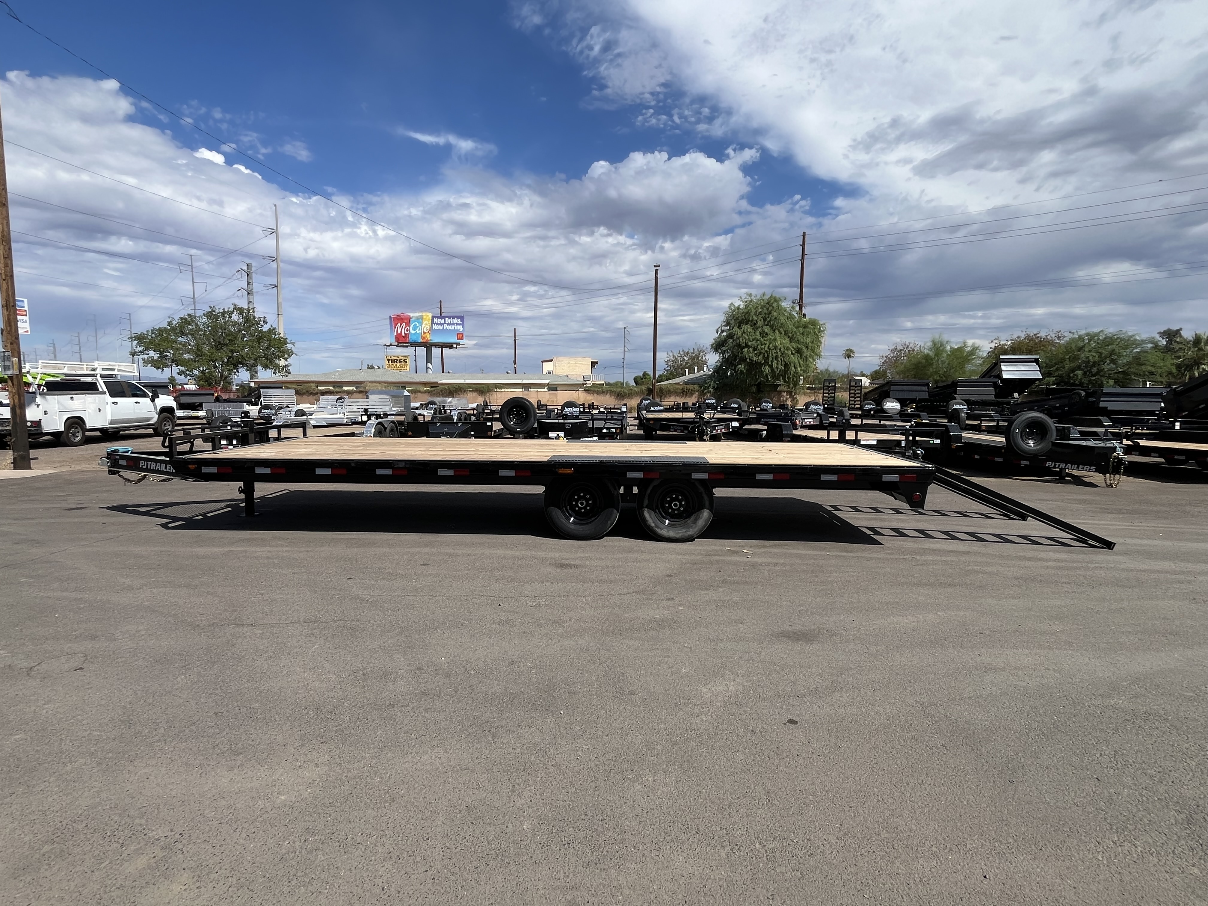 PJ Trailers 24x102 Tandem Axle Deckover, 14K GVWR, Slide In Ramps, 14 Ply Tires