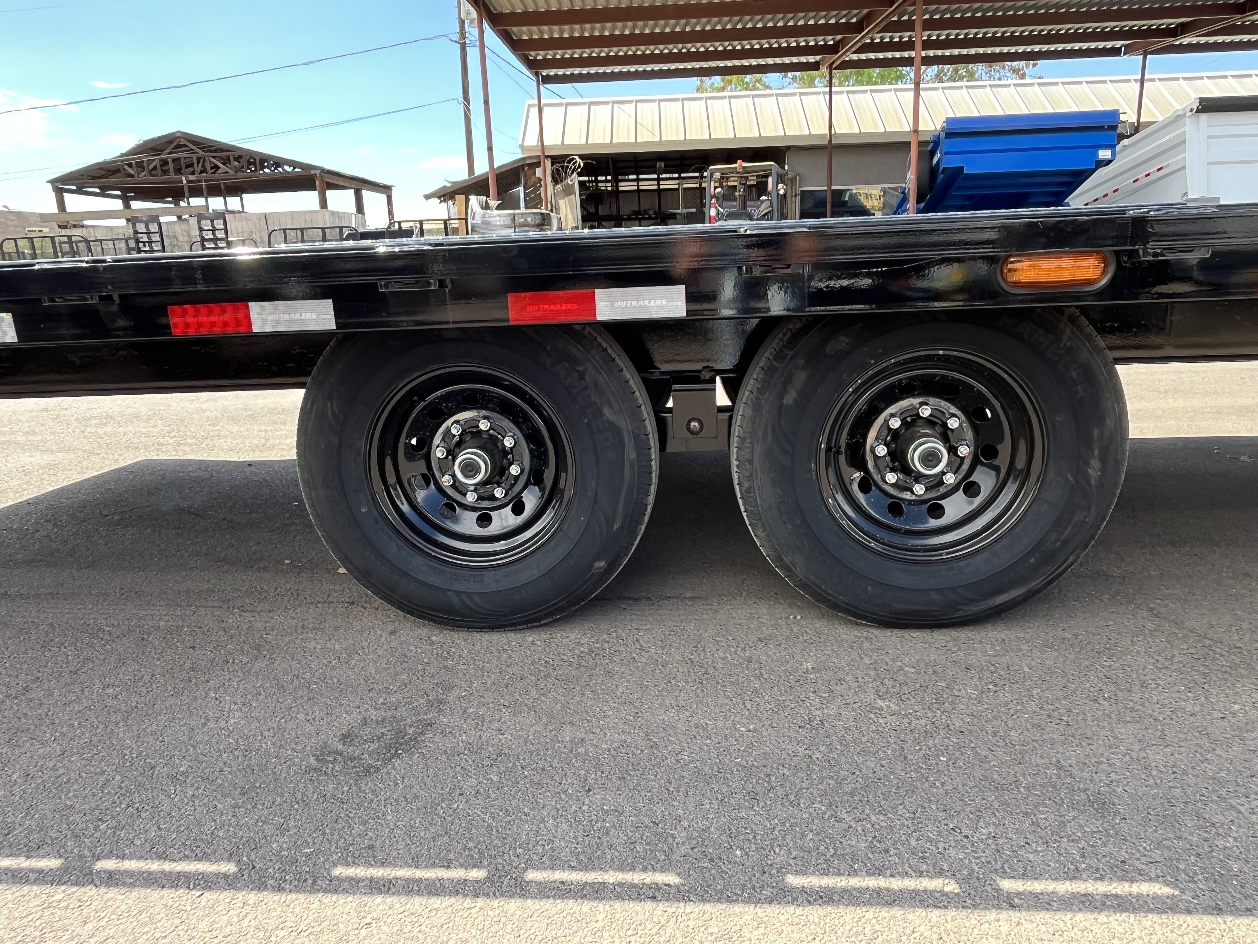 PJ Trailers 24x102 Tandem Axle Deckover, 14K GVWR, Slide In Ramps, 14 Ply Tires