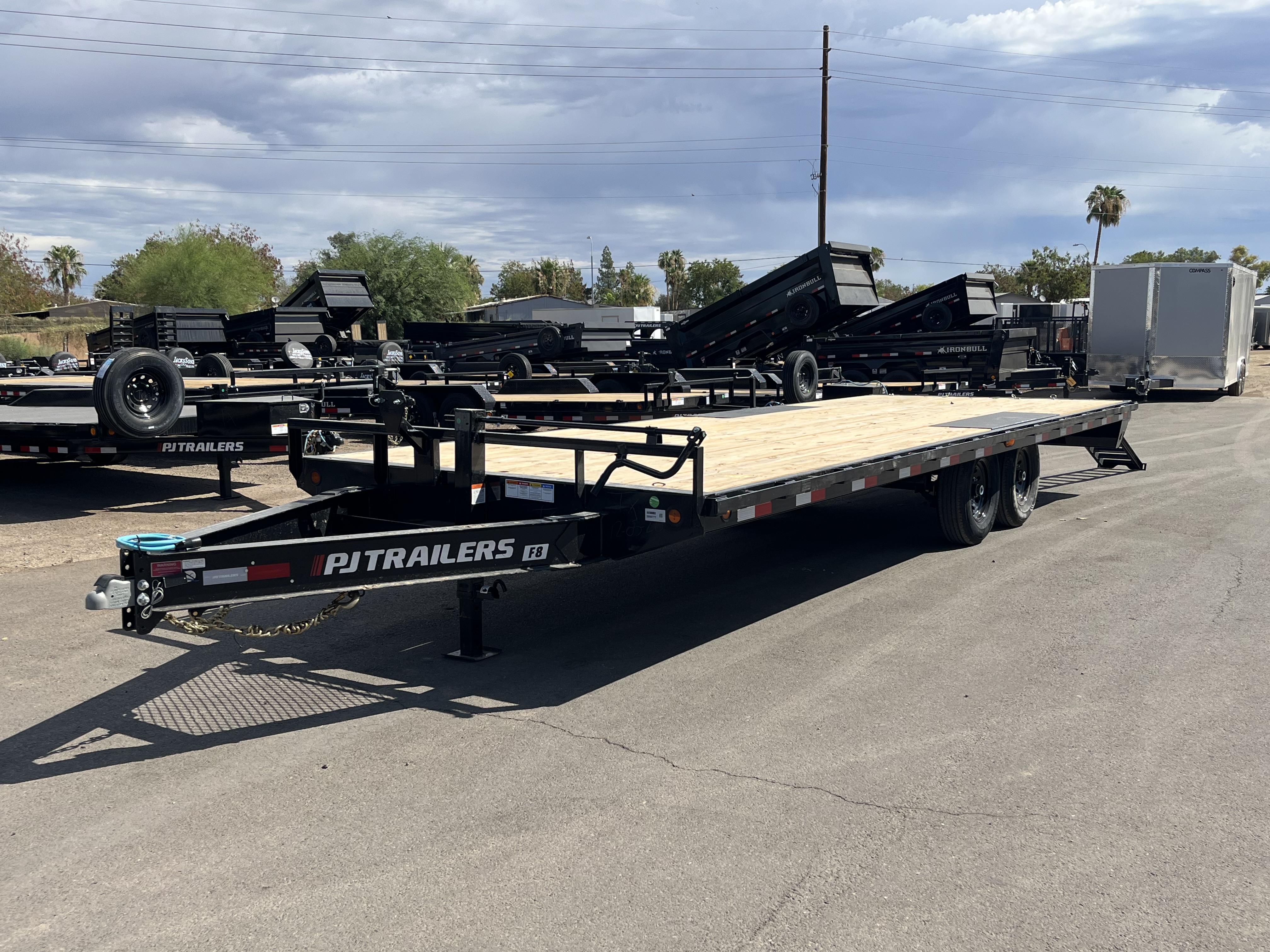 PJ Trailers 24x102 Tandem Axle Deckover, 14K GVWR, Slide In Ramps, 14 Ply Tires
