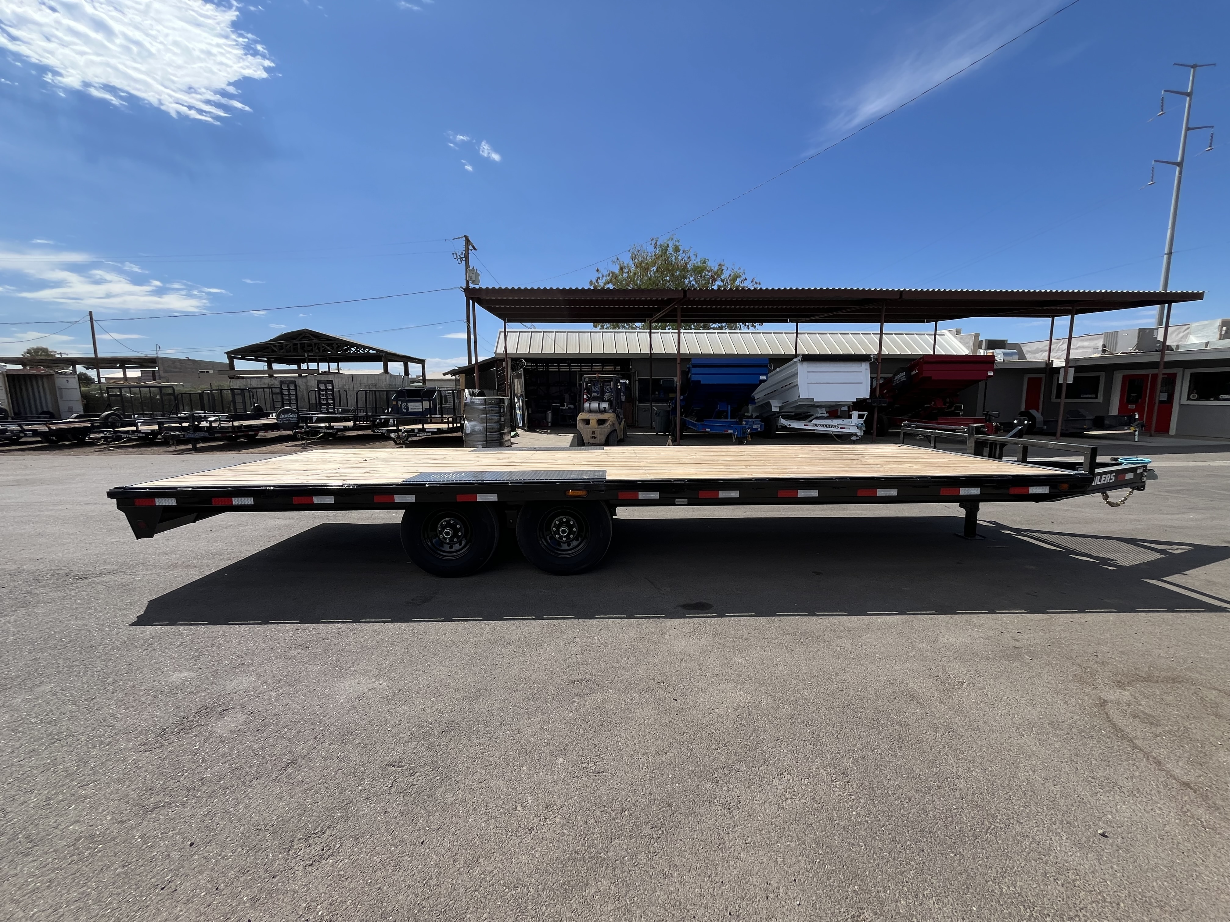 PJ Trailers 24x102 Tandem Axle Deckover, 14K GVWR, Slide In Ramps, 14 Ply Tires