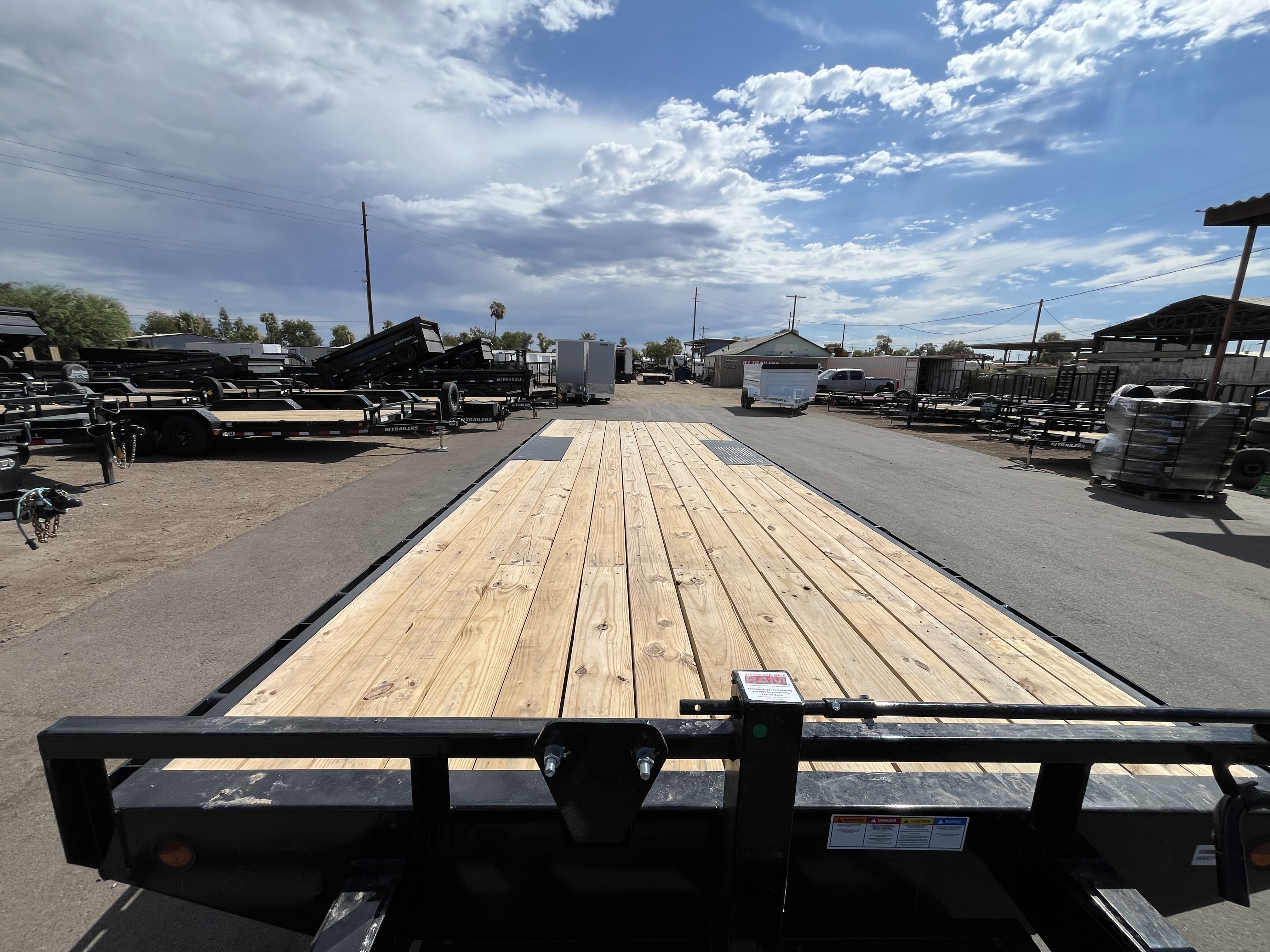 PJ Trailers 24x102 Tandem Axle Deckover, 14K GVWR, Slide In Ramps, 14 Ply Tires