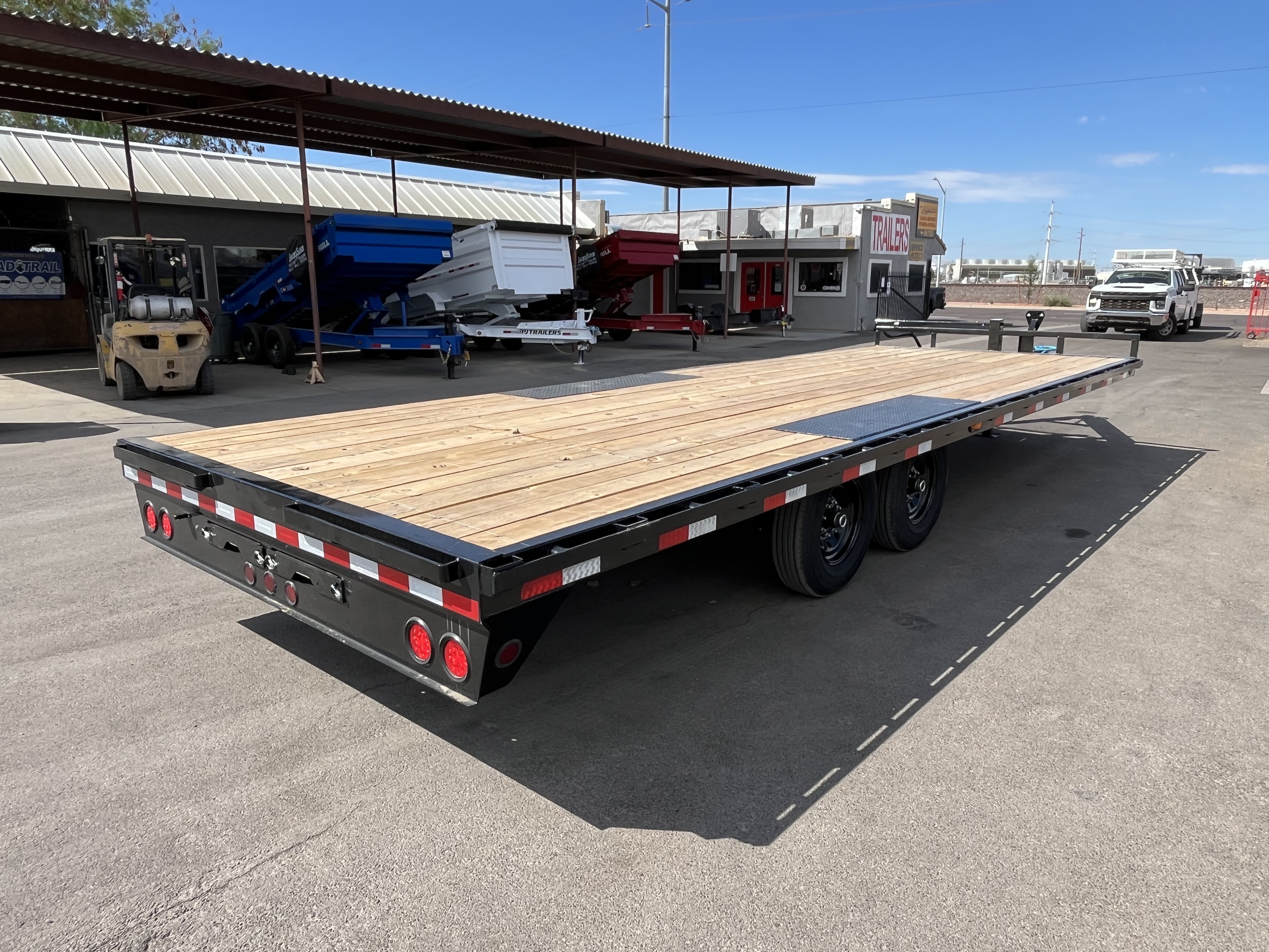 PJ Trailers 24x102 Tandem Axle Deckover, 14K GVWR, Slide In Ramps, 14 Ply Tires