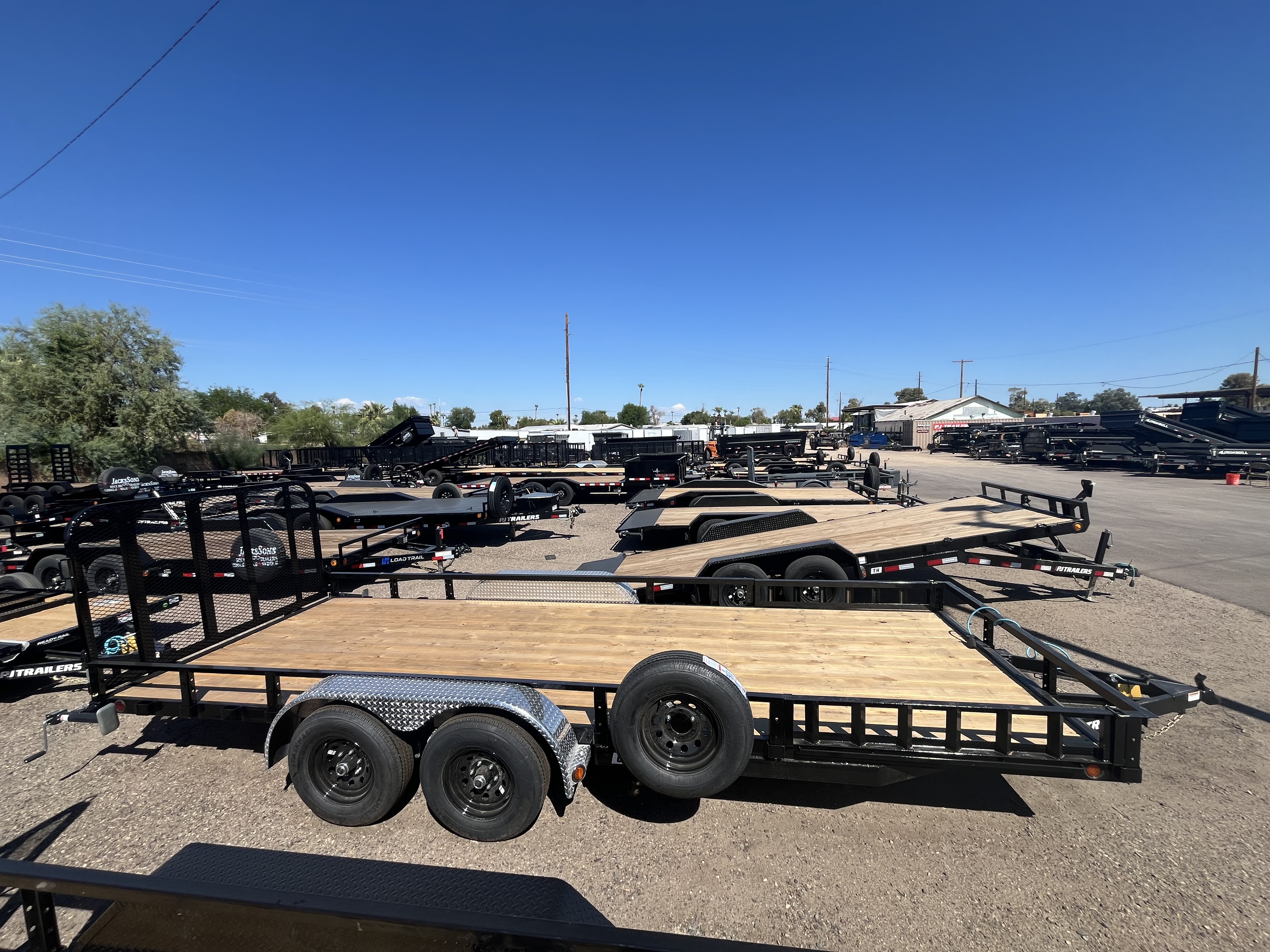 PJ Trailers 20x83 Tandem Axle, 10K GVWR, Channel Utility w/ 4' Fold Up Gate, ATV Ramps