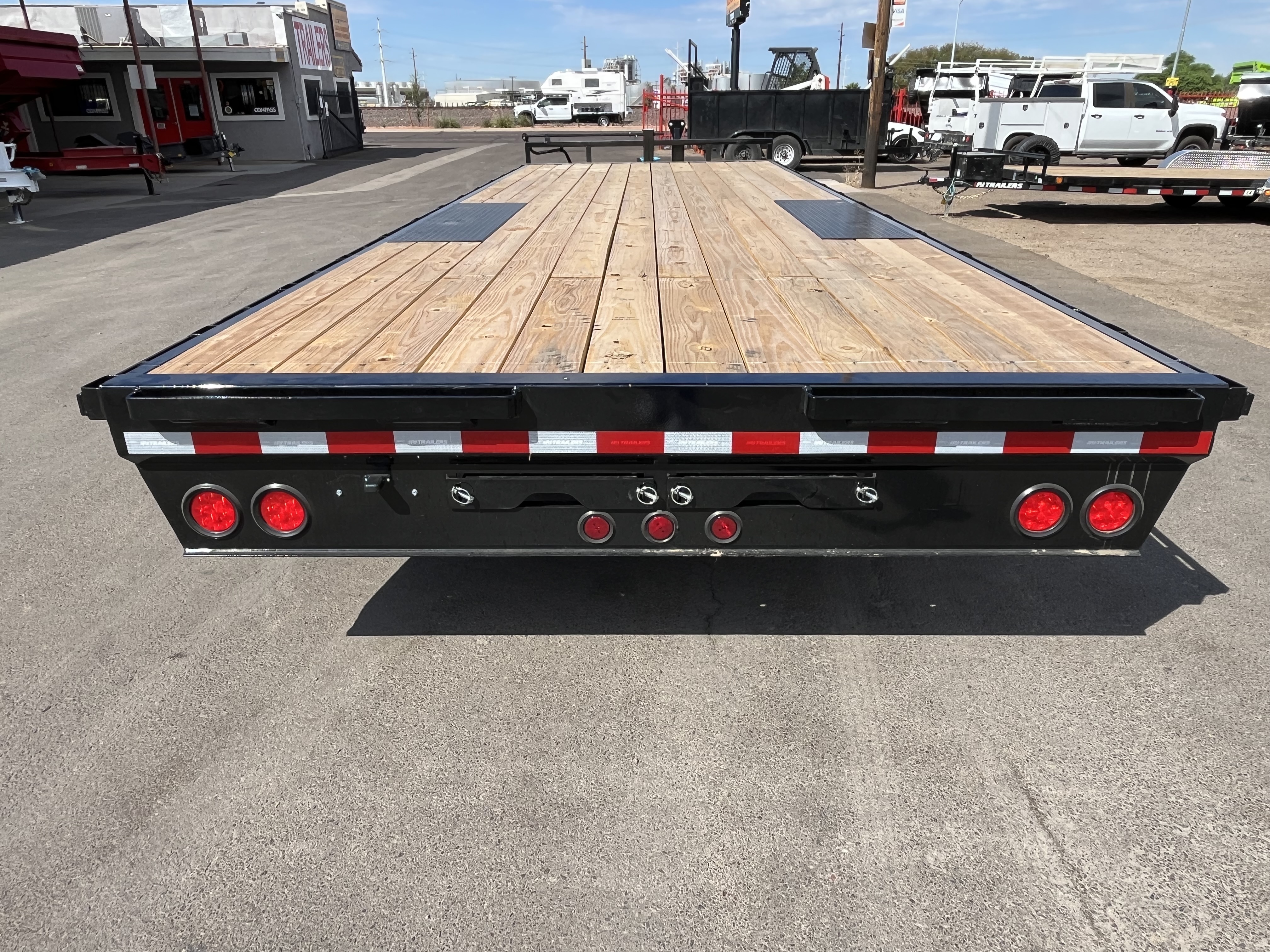 PJ Trailers 24x102 Tandem Axle Deckover, 14K GVWR, Slide In Ramps, 14 Ply Tires